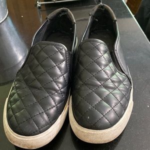 Black guess sneakers slip on’s use quite a bit still in decent shape